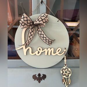 Hand made wood “Home” sign with hanging wood dream catcher
